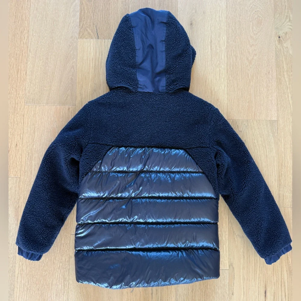 Moncler Boys down Jacket with shearling detail on the front, size 10.